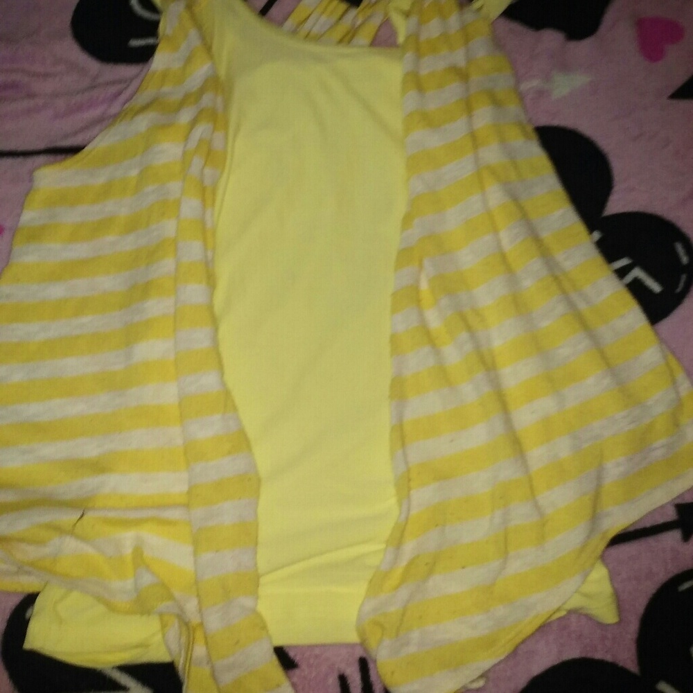 Yellow tank top and over coat